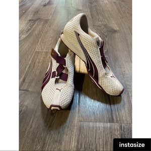 Puma Cell Women’s running shoes size 7.5. White and plum purple.